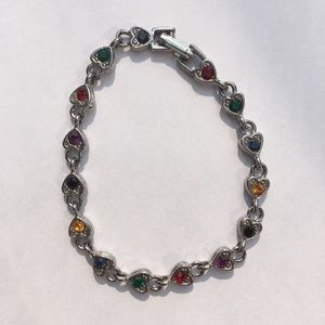 Silver heart bracelet with multi colored jewels